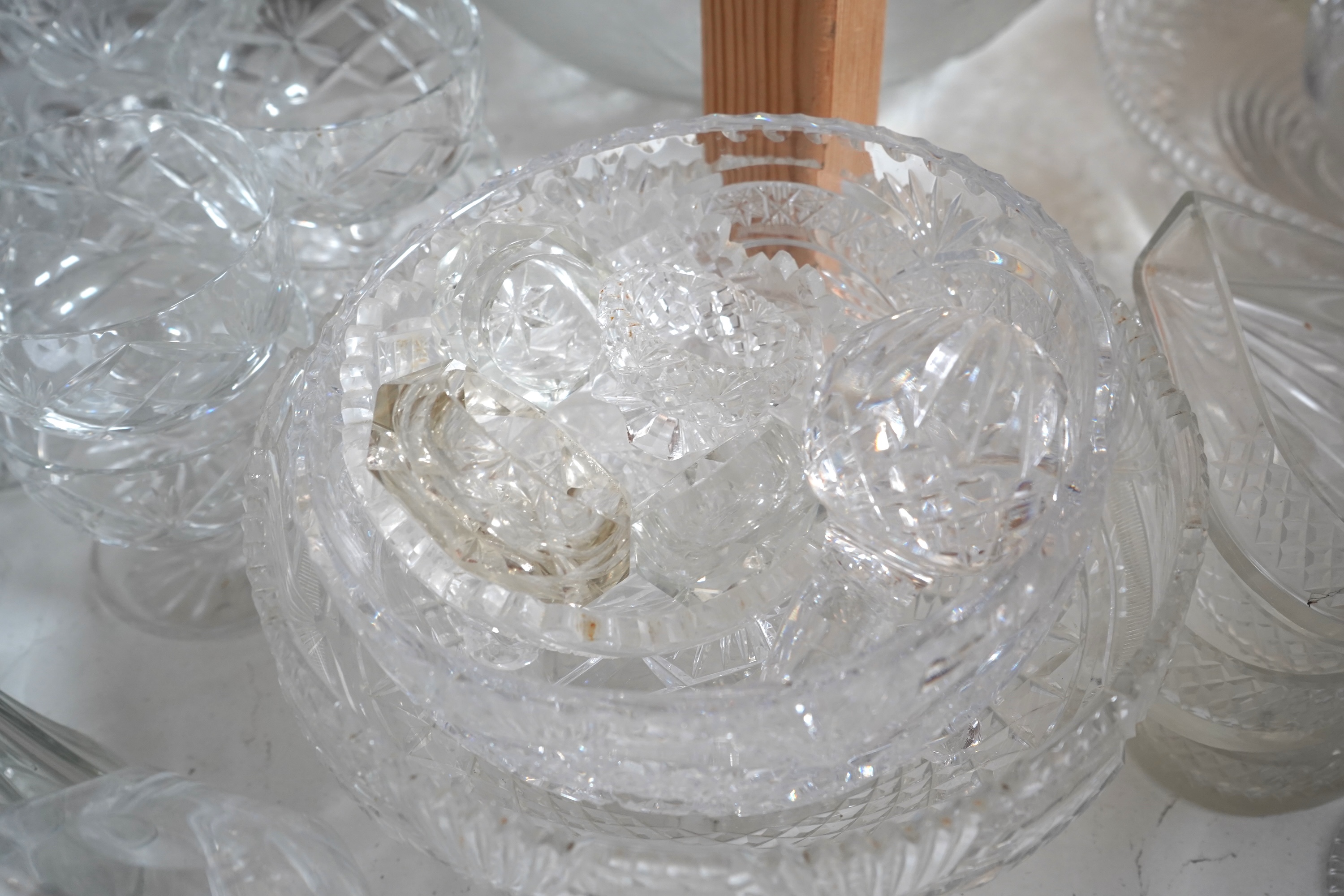 A collection of various cut glass